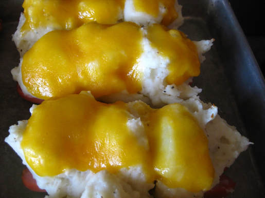 potato boats (hot dogs with mashed potatoes and melted cheese on top)