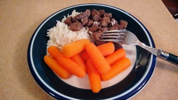 steak, cooked carrots, and rice